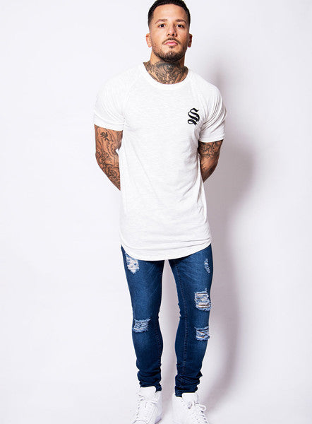 Mid Blue Rip Repair Skinny Jeans